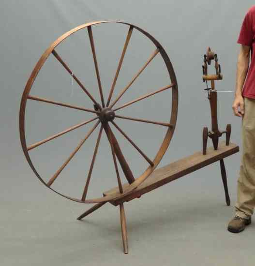 Appraisal: th c New England spinning wheel ' Length ' Ht