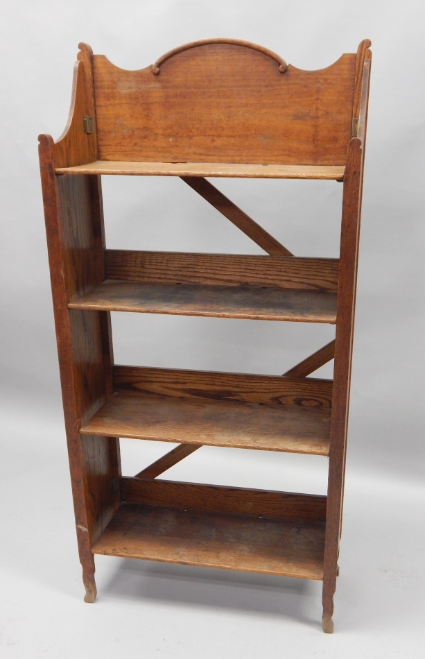 Appraisal: An unusual early thC Campaign type oak folding bookcase with