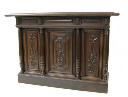 Appraisal: Renaissance style carved walnut bar The rectangular top with a