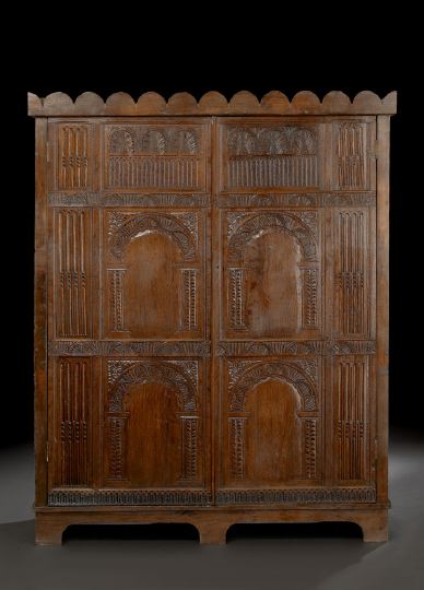 Appraisal: Continental Provincial Oak Armoire second quarter th century the scalloped