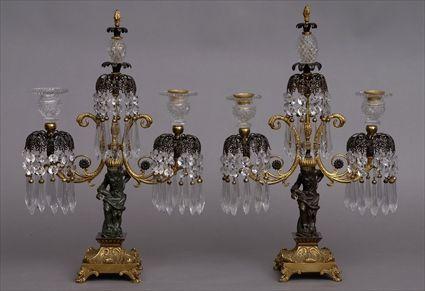 Appraisal: PAIR OF REGENCY-STYLE CUT-GLASS MOUNTED BRONZE AND GILT-METAL FIGURAL TWO-LIGHT