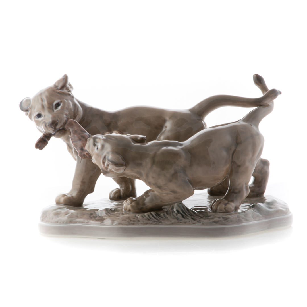 Appraisal: Dahl-Jensen porcelain lion cub group modeled as two lion cubs