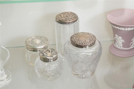 Appraisal: FOUR SMALL GLASS DRESSER JARS WITH STERLING SILVER LIDS One