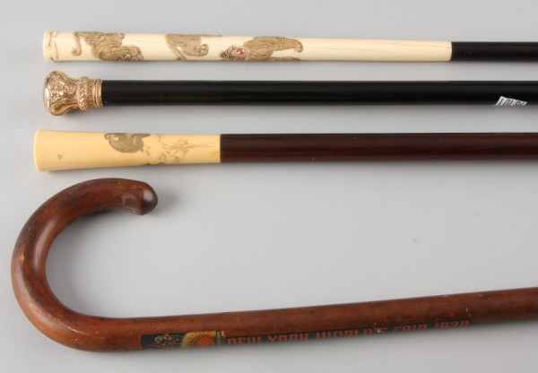 Appraisal: Lot of four canes One cane with a gold top