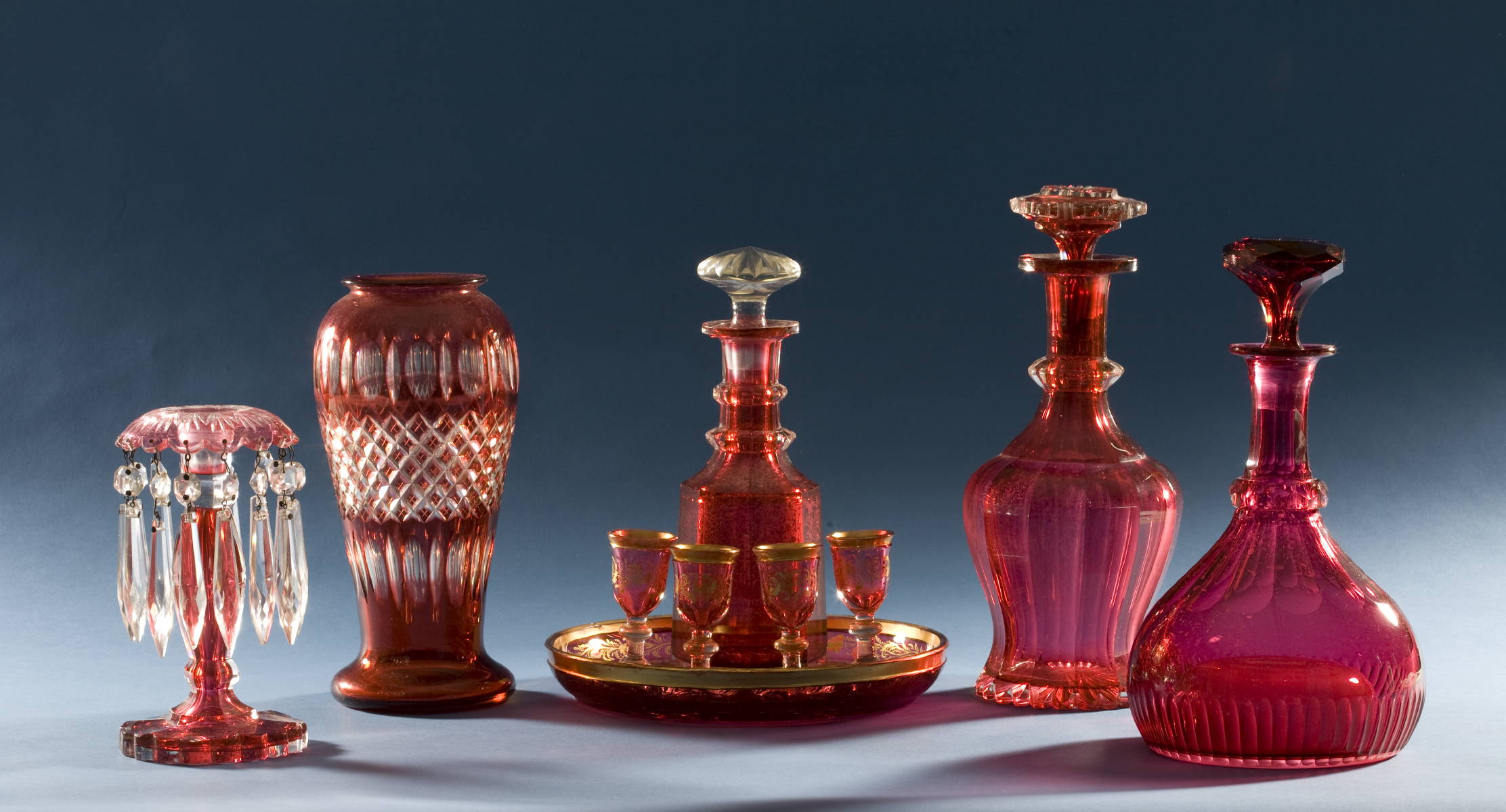 Appraisal: GROUP OF ENGLISH CRANBERRY GLASS TABLE OBJECTS INCLUDING AN ASSEMBLED