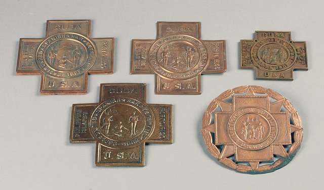 Appraisal: Spanish-American Floral Tribute plaques copper brass pressed paper Used to