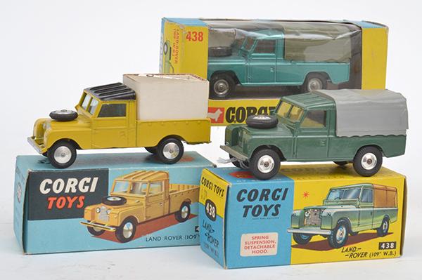 Appraisal: THREE CORGI LAND ROVER MODELS INCLUDING MUSTARD WITH BLACK ROOF