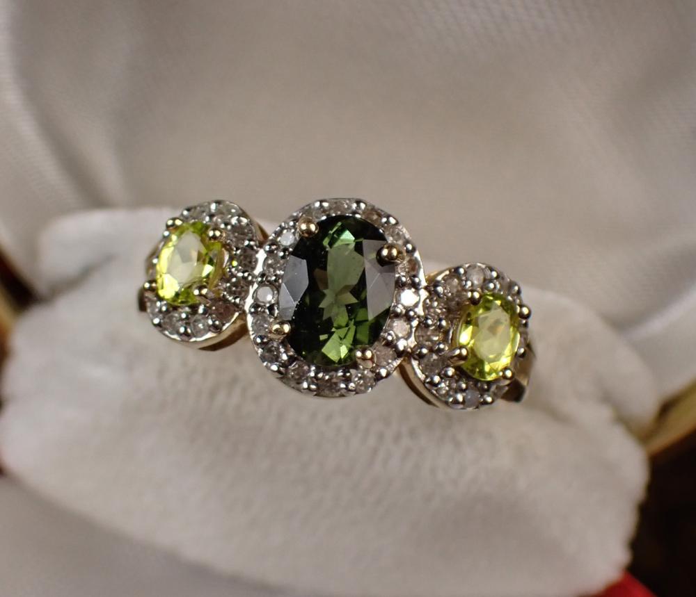 Appraisal: MULTI-COLOR TOURMALINE AND DIAMOND RING The k yellow and white