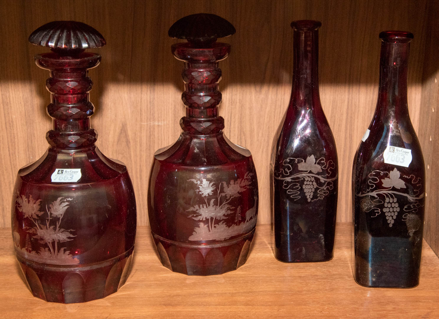 Appraisal: Four pieces of ruby cut-to-clear glass including pair of bottles