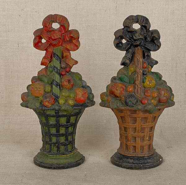 Appraisal: Pair of painted cast iron fruit basket doorstops th c