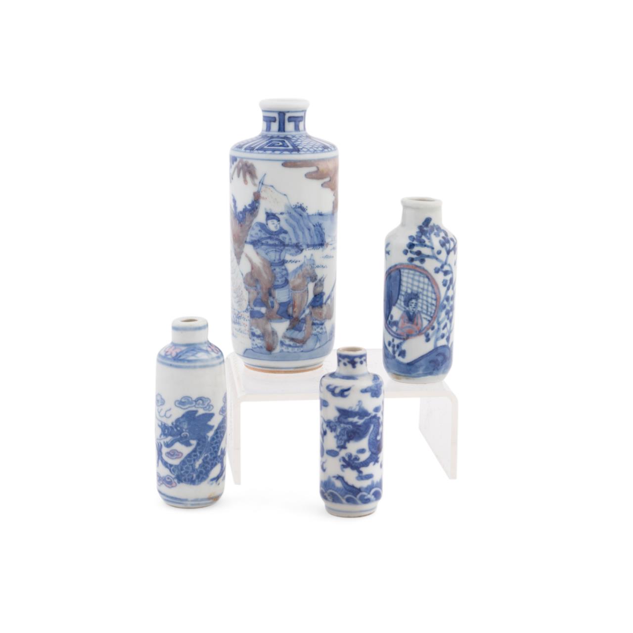 Appraisal: FOUR CHINESE BLUE WHITE SNUFF BOTTLES Four Chinese blue and