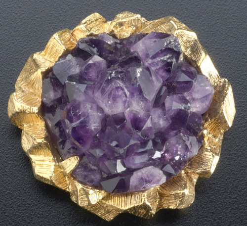 Appraisal: Massive amethyst druze and k yg brooch Circular crystal cluster