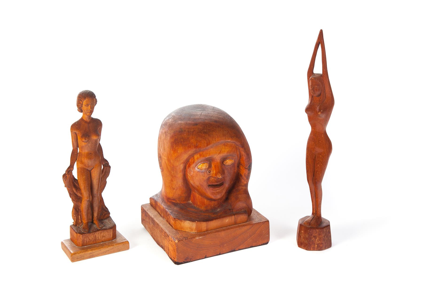 Appraisal: THREE AMERICAN CARVINGS Mid th century Carved wooden figures of