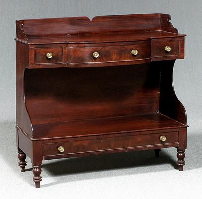 Appraisal: Classical figured mahogany wash stand figured mahogany veneers dovetailed drawers