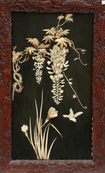 Appraisal: A JAPANESE BONE AND IVORY PANEL Carved in high relief