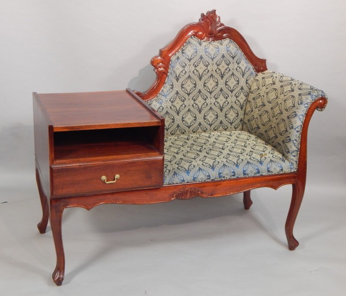 Appraisal: A modern hardwood telephone seat with a padded seating section