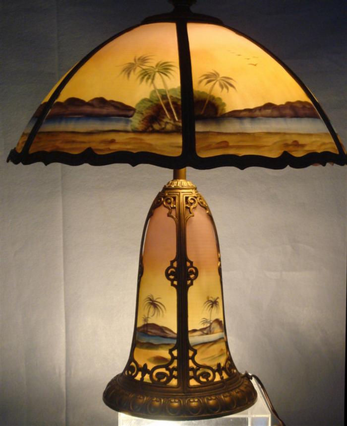 Appraisal: panel reverse painted table lamp depicting desert landscape base with