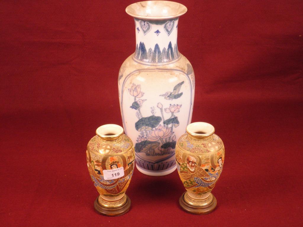 Appraisal: A pair of Japanese earthenware satsuma type vases and stands