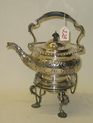 Appraisal: AN ENGLISH SILVERPLATED TEAPOT on stand The teapot in a