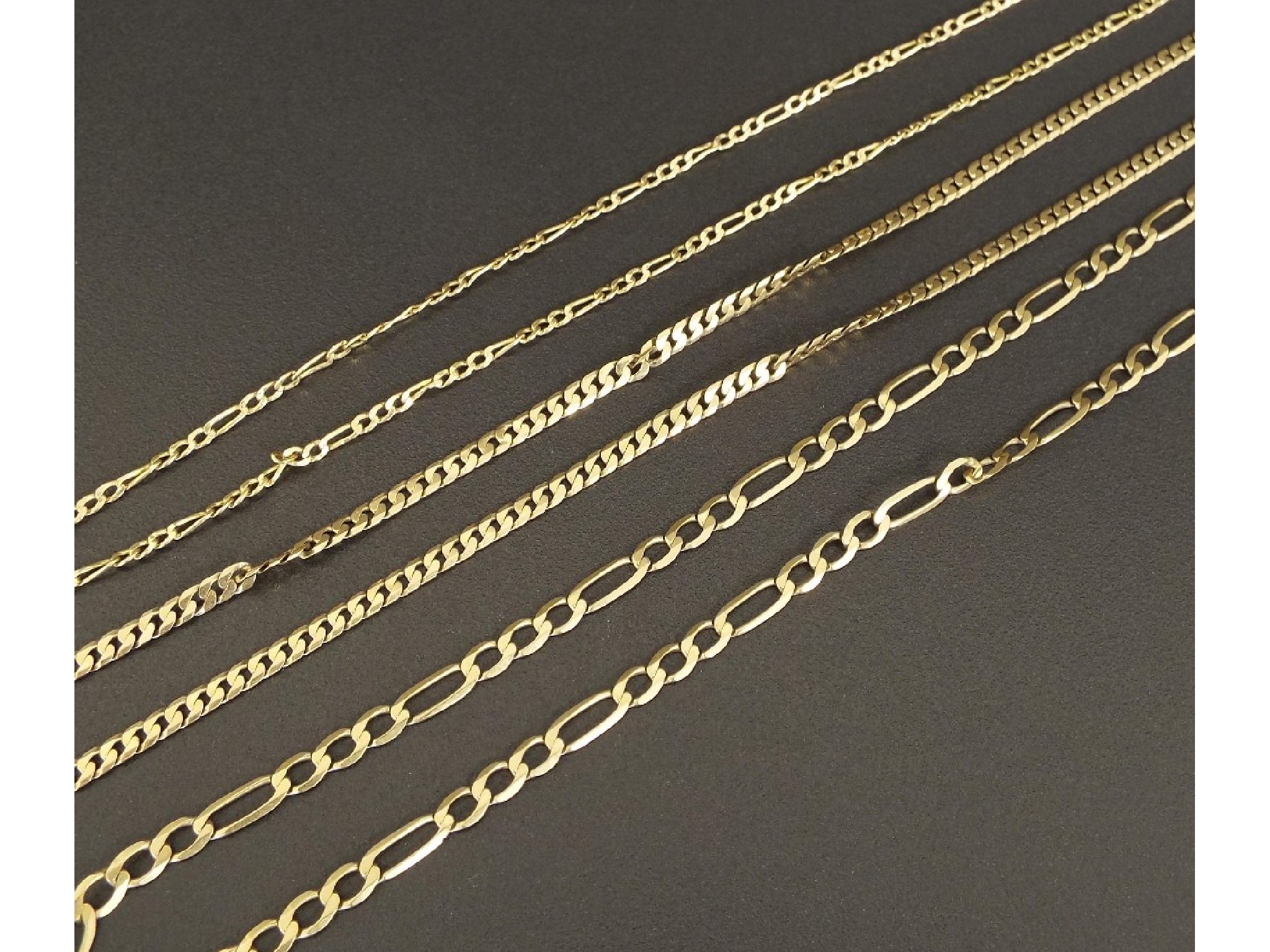 Appraisal: Three ct yellow gold necklets gm