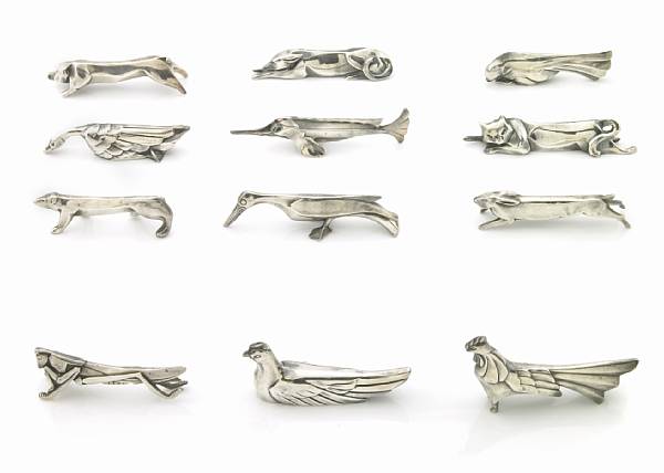 Appraisal: A set of nine Gallia silverplate figural knife rests for