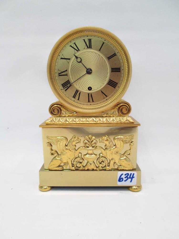 Appraisal: FRENCH EMPIRE STYLE ORMOLU TABLE CLOCK James Tupman Bloomsbury London