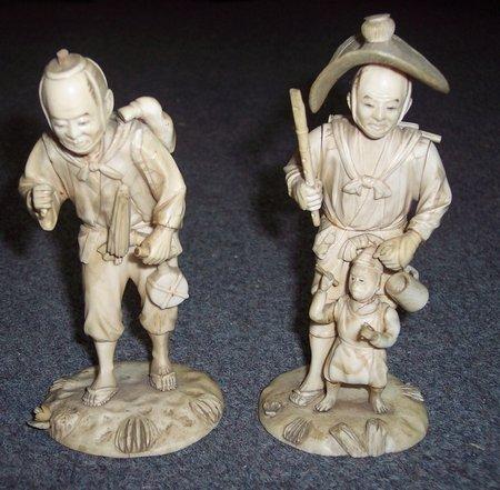 Appraisal: A pair of late th Century Japanese carved ivory figures