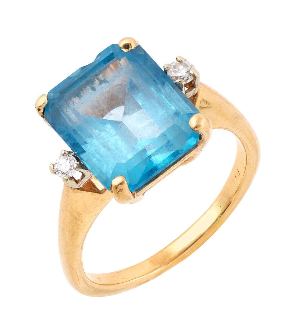 Appraisal: KT YELLOW GOLD BLUE TOPAZ AND DIAMOND RING APPROX TOTAL