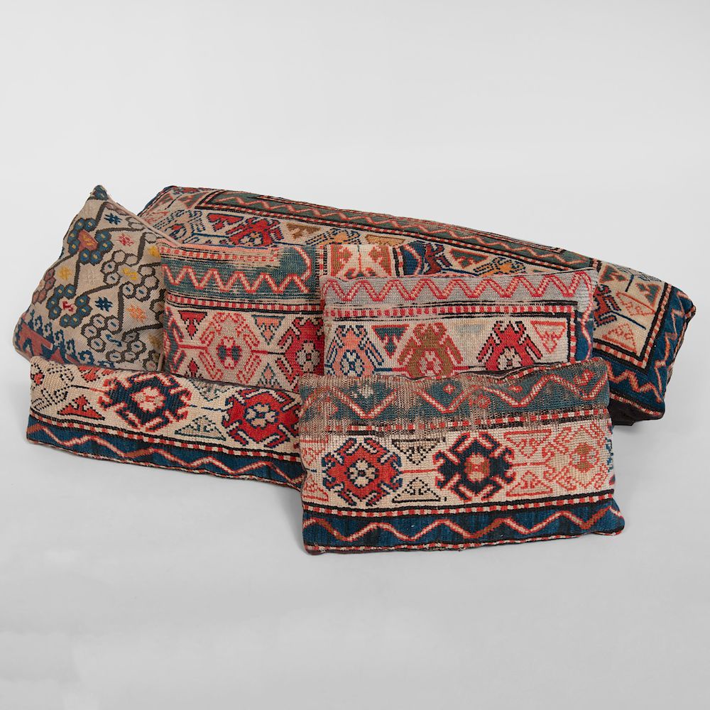 Appraisal: Group of Six Pillows Covered in Carpet Fragments The largest