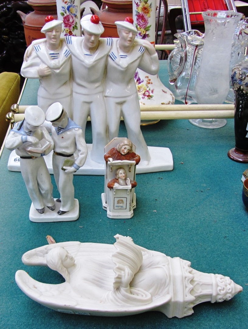 Appraisal: An Art Deco style pottery figure group in the manner