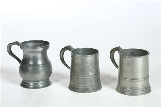 Appraisal: THREE PEWTER MEASURES England th century Two pint tankards by