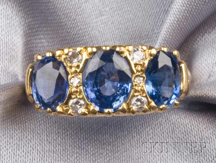 Appraisal: kt Gold and Sapphire Three-Stone Ring England prong-set with oval-cut