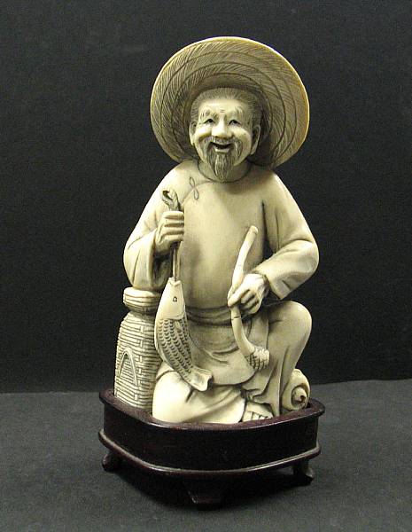 Appraisal: A tinted ivory figure of a fisherman Wearing a straw