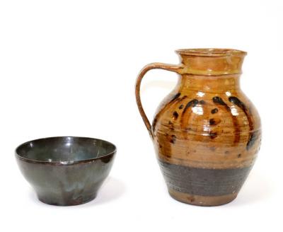 Appraisal: Sidney Tustin a slipware jug decorated rust and brown patterns