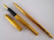 Appraisal: A gold plated Parker fountain pen and propelling pencil set