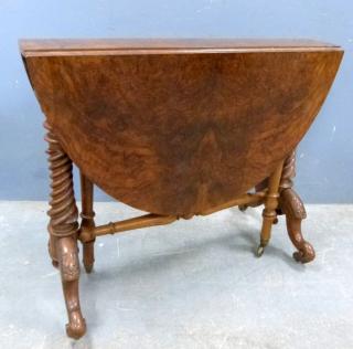 Appraisal: th century walnut Sutherland table on twin spiral supports