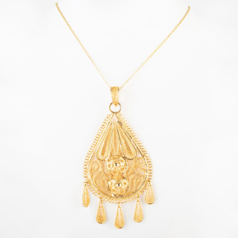 Appraisal: Filigree Gold Tone Metal Tear Drop Pendant Together with a