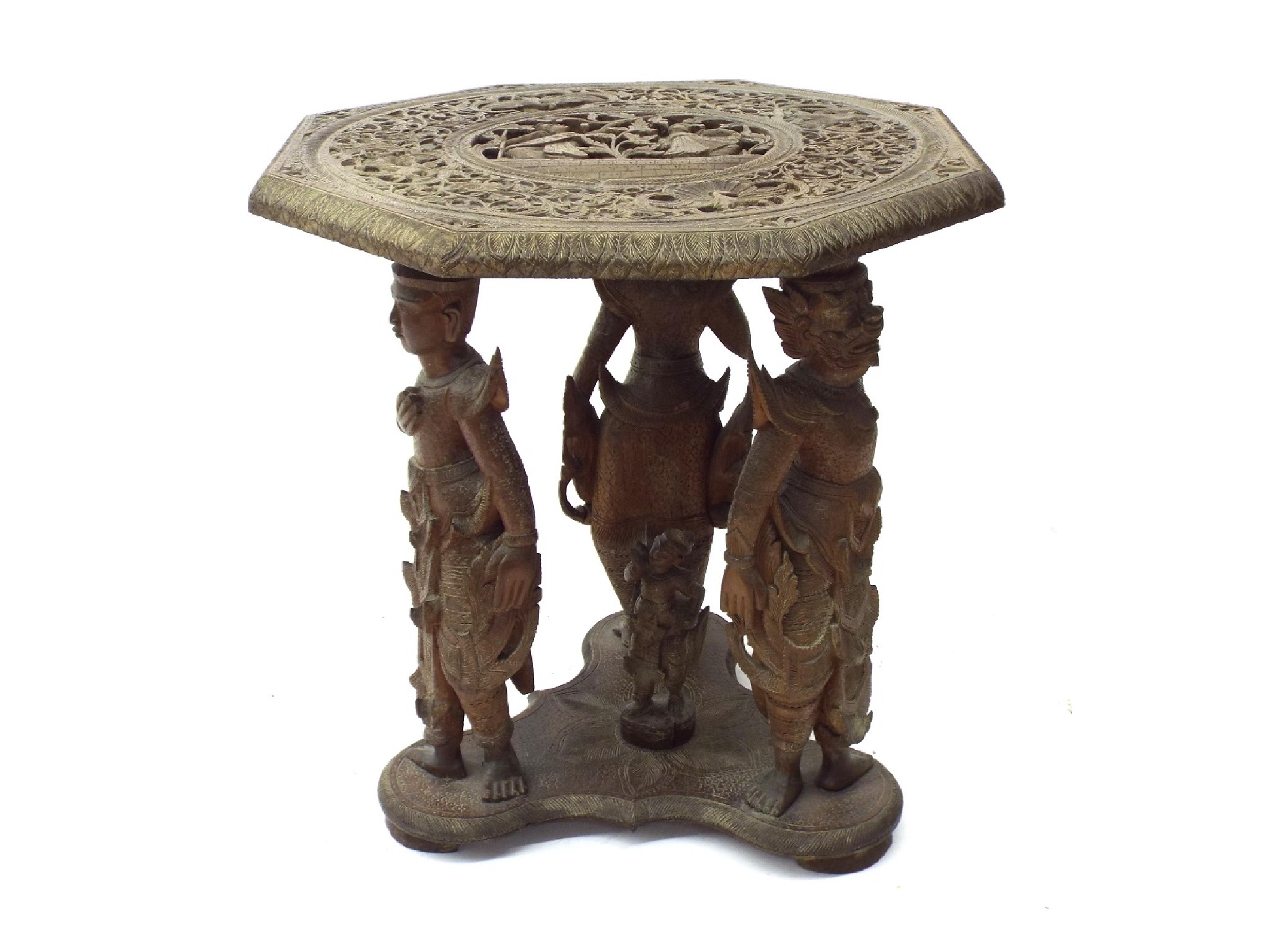 Appraisal: Possibly Burmese carved hardwood centre table the octagonal top decorated