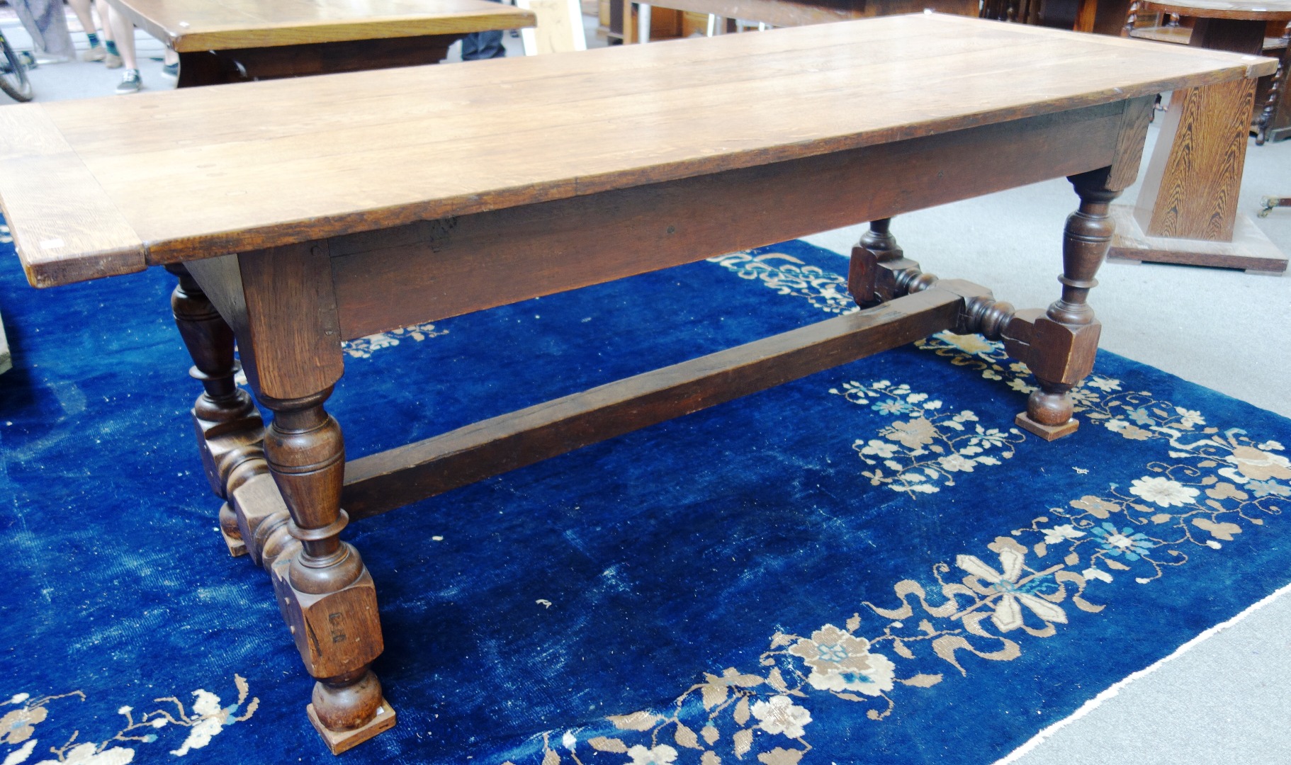 Appraisal: A th century style oak refectory table the cleated plank