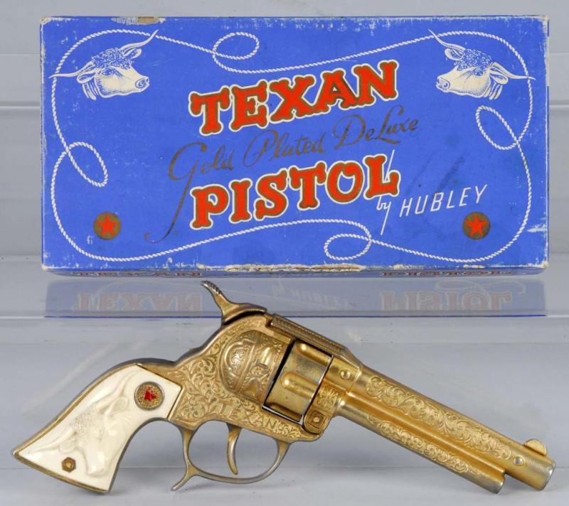 Appraisal: Gold Hubley Texan Cap Gun Description Has fired a lot