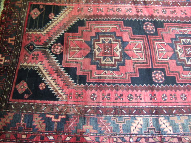 Appraisal: A Hamaden rug of Caucasian design the deep blue shaped