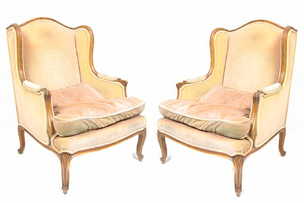 Appraisal: A pair of Louis XV style mixed wood armchairs height