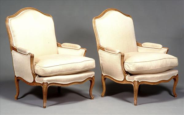 Appraisal: A pair of beech framed and upholstered armchairs in Louis