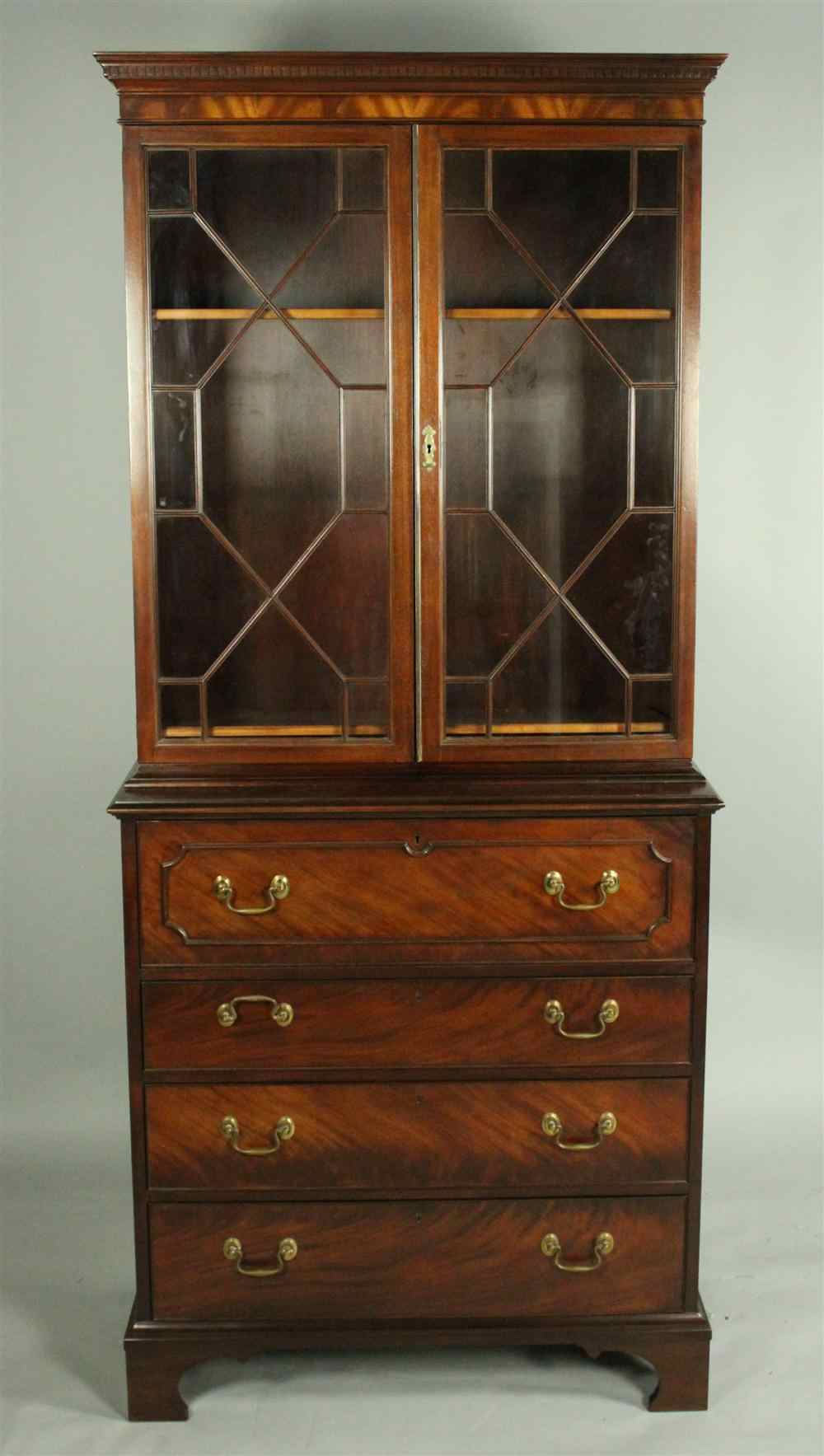 Appraisal: BAKER GEORGIAN STYLE MAHOGANY SECRETAIRE in two parts the upper