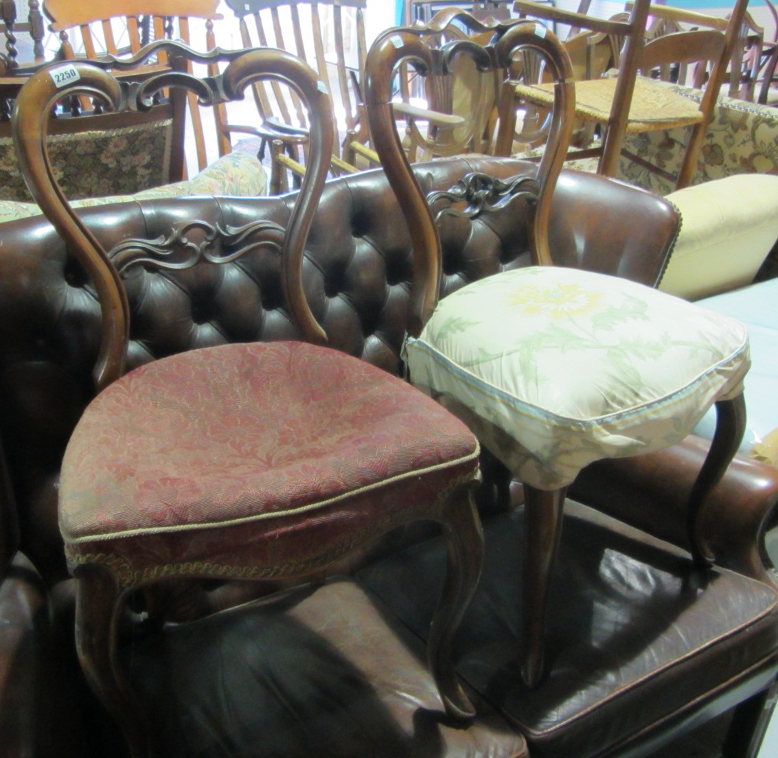 Appraisal: A pair of th century walnut balloon back bedroom chairs