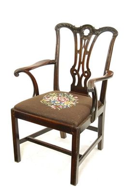 Appraisal: A George III mahogany open armchair the leaf carved top