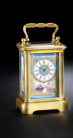 Appraisal: A late th century French porcelain mounted miniature carriage timepiece