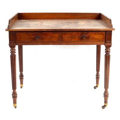 Appraisal: A George III mahogany dressing table in the manner of