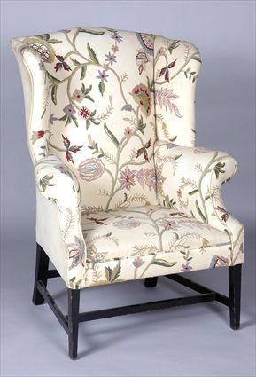 Appraisal: CHIPPENDALE MAHOGANY WING ARMCHAIR With serpentine top rail shaped wings