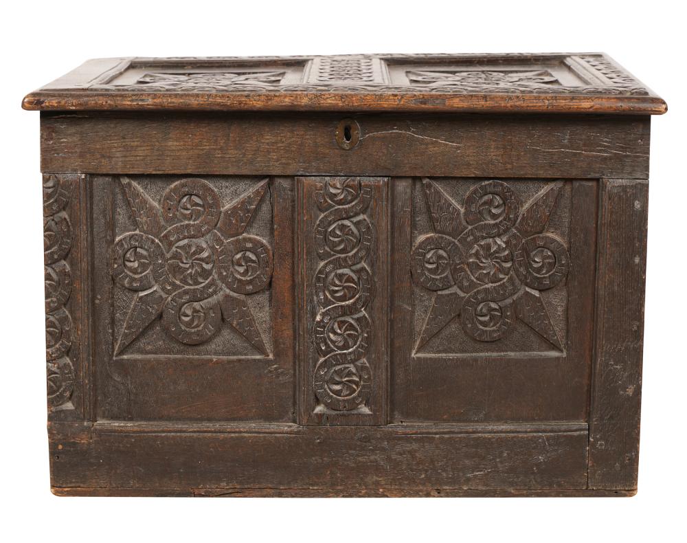 Appraisal: FRENCH CARVED OAK TRUNKthe hinged lid enclosing a painted undivided